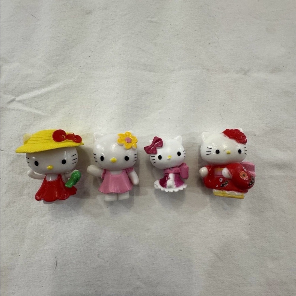 Sanrio Hello Kitty Small Collectible Figurines Lot Of 4